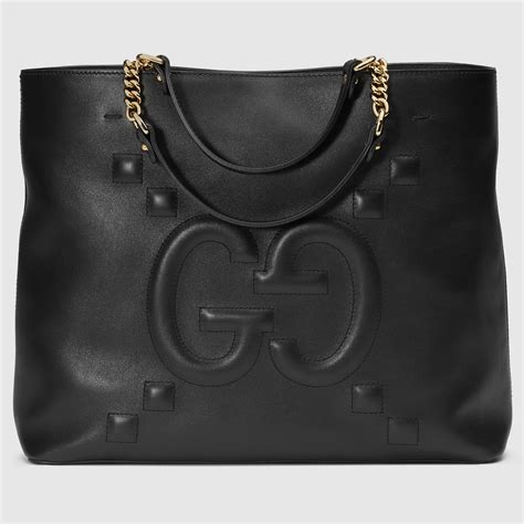 gucci tote black leather|gucci embossed leather tote bag.